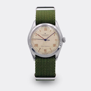 ROLEX | Oyster | Shock Resisting | Bucherer Gold Roman Dial | Ref. 4377 | 1940s