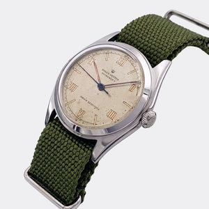 ROLEX | Oyster | Shock Resisting | Bucherer Gold Roman Dial | Ref. 4377 | 1940s