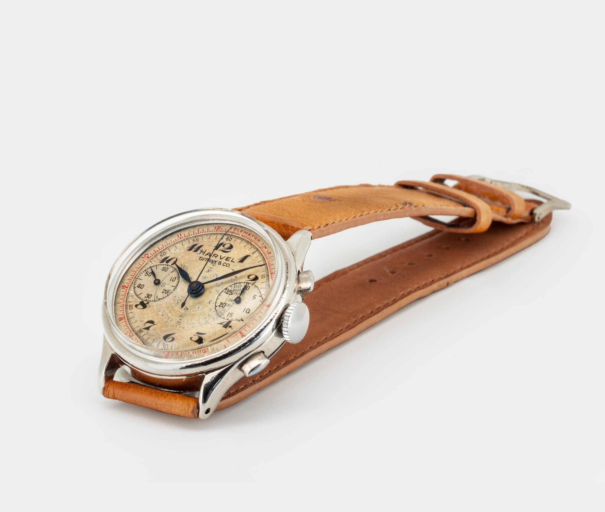 HARVEL | by TIFFANY & CO. - double signed | Chronograph | Blued Hands & Totalizers | Cream Dial | Multicolored | 1950s